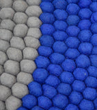 Tapis rond en boules de laine feutrée