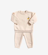 Ensemble uni avec broderie orange